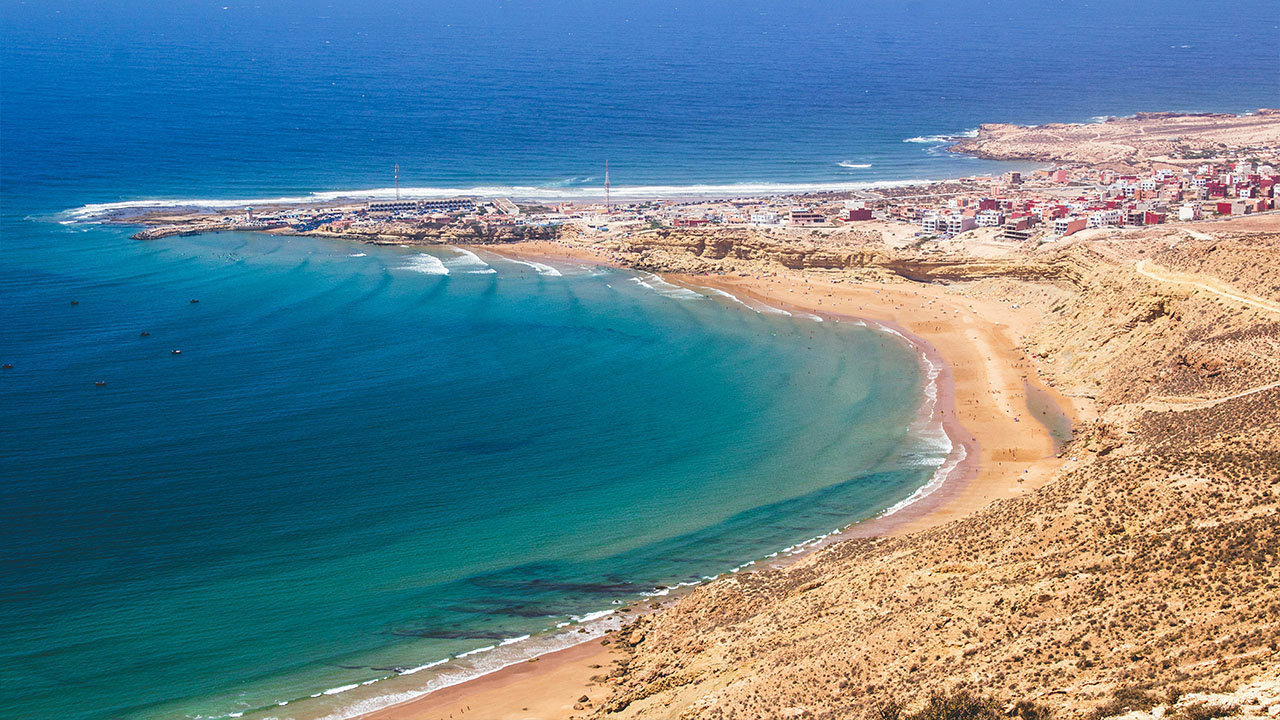 Agadir's coast: Sandy beaches and urban backdrop.