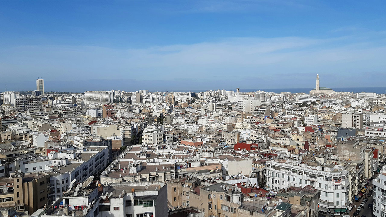 Casablanca cityscape with Hassan II Mosque visible.