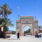 Ornate gate in Rissani, Morocco under blue sky